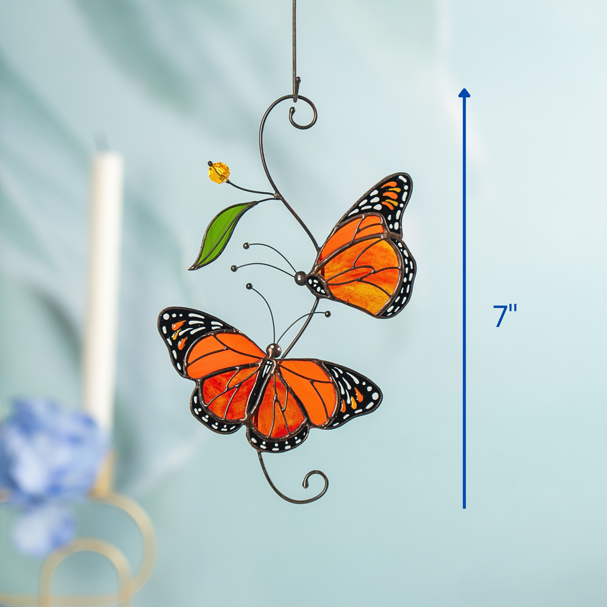 Vertical stained glass monarch butterflies suncatcher shown with size measurement at 7 inches, ideal for window and garden use.