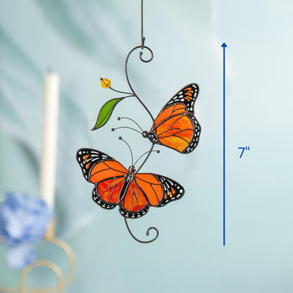 Vertical stained glass monarch butterflies suncatcher shown with size measurement at 7 inches, ideal for window and garden use.
