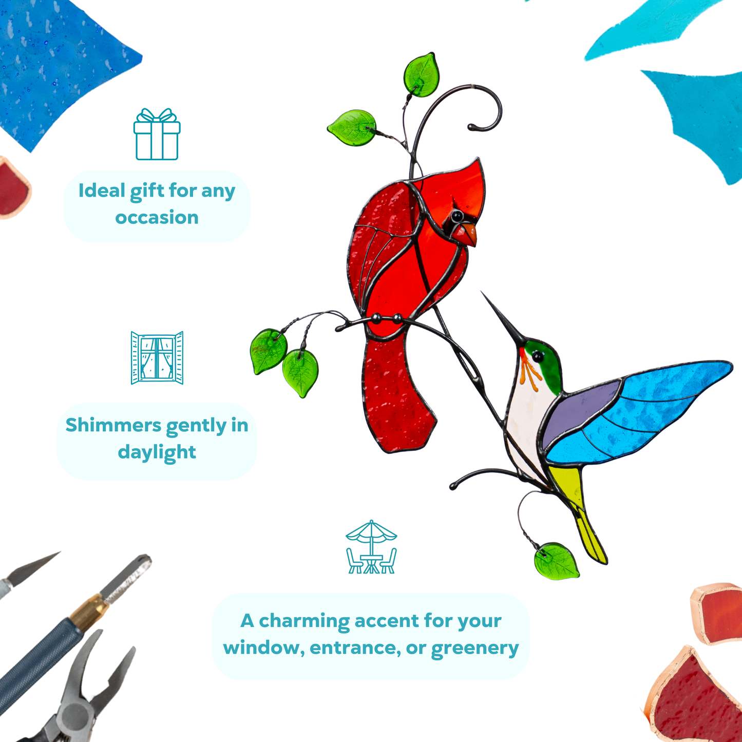 Stained glass suncatcher with red cardinal and colorful hummingbird on leafy branches.