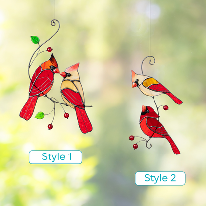 Side-by-side display of two stained glass cardinal couples, labeled Style 1 and Style 2, against a soft landscape
