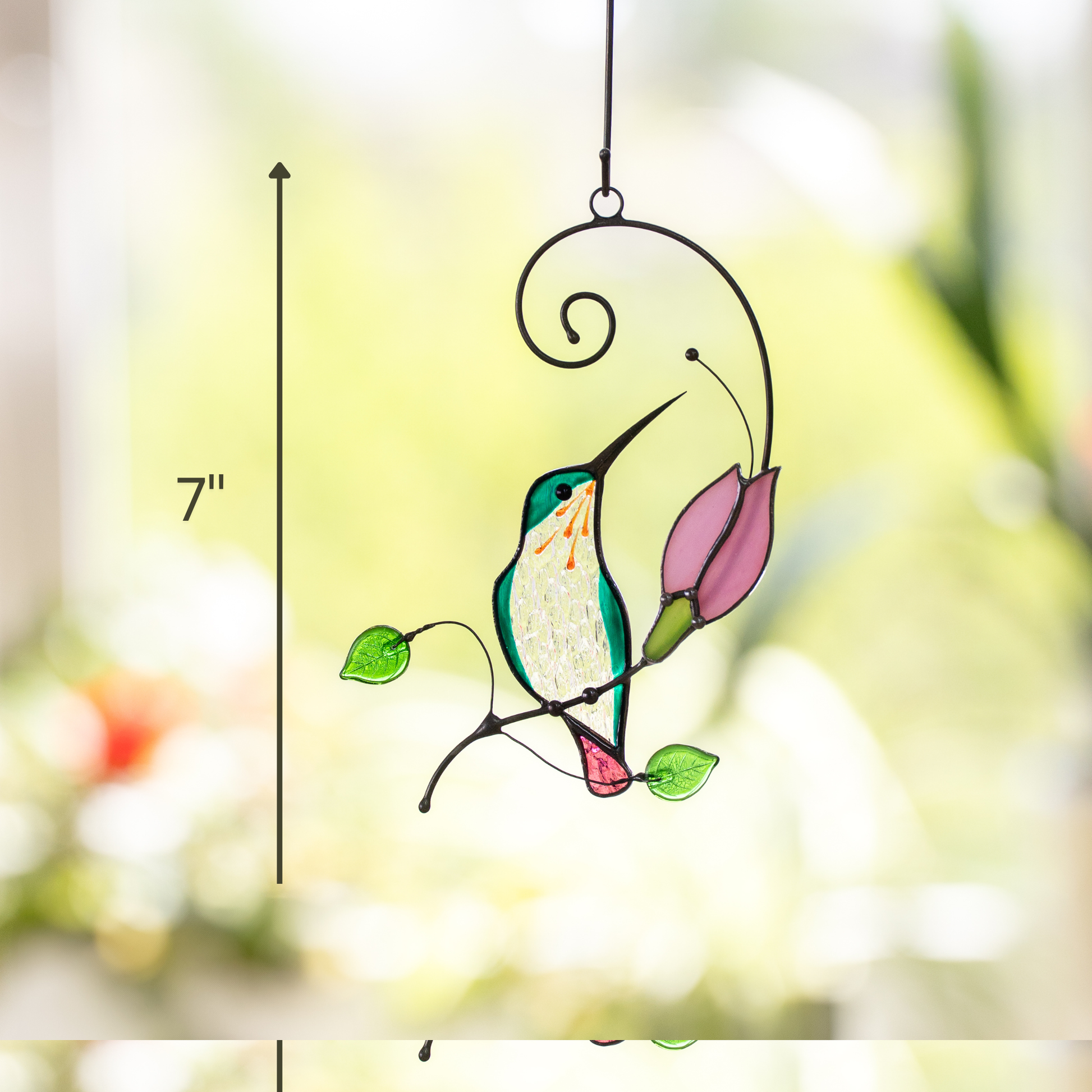 Hummingbird stained glass suncatcher next to a pink flower, perfect size - 7 inches, for window or garden decoration