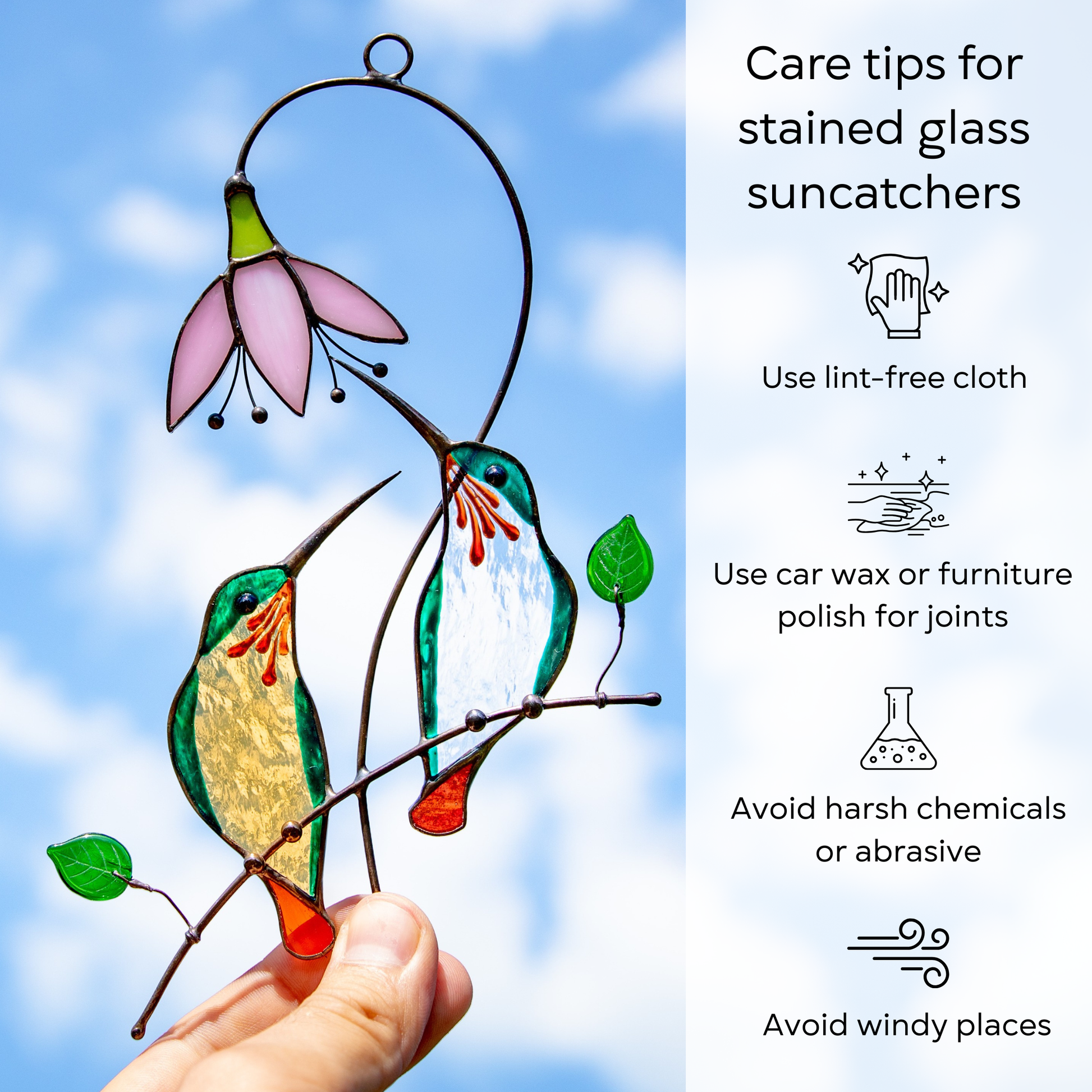 Suncatcher pair of green hummingbirds with sky on the background and care tips beside: use lint-free cloth, polish joints with car wax or furniture polish, avoid harsh chemicals, and windy places.